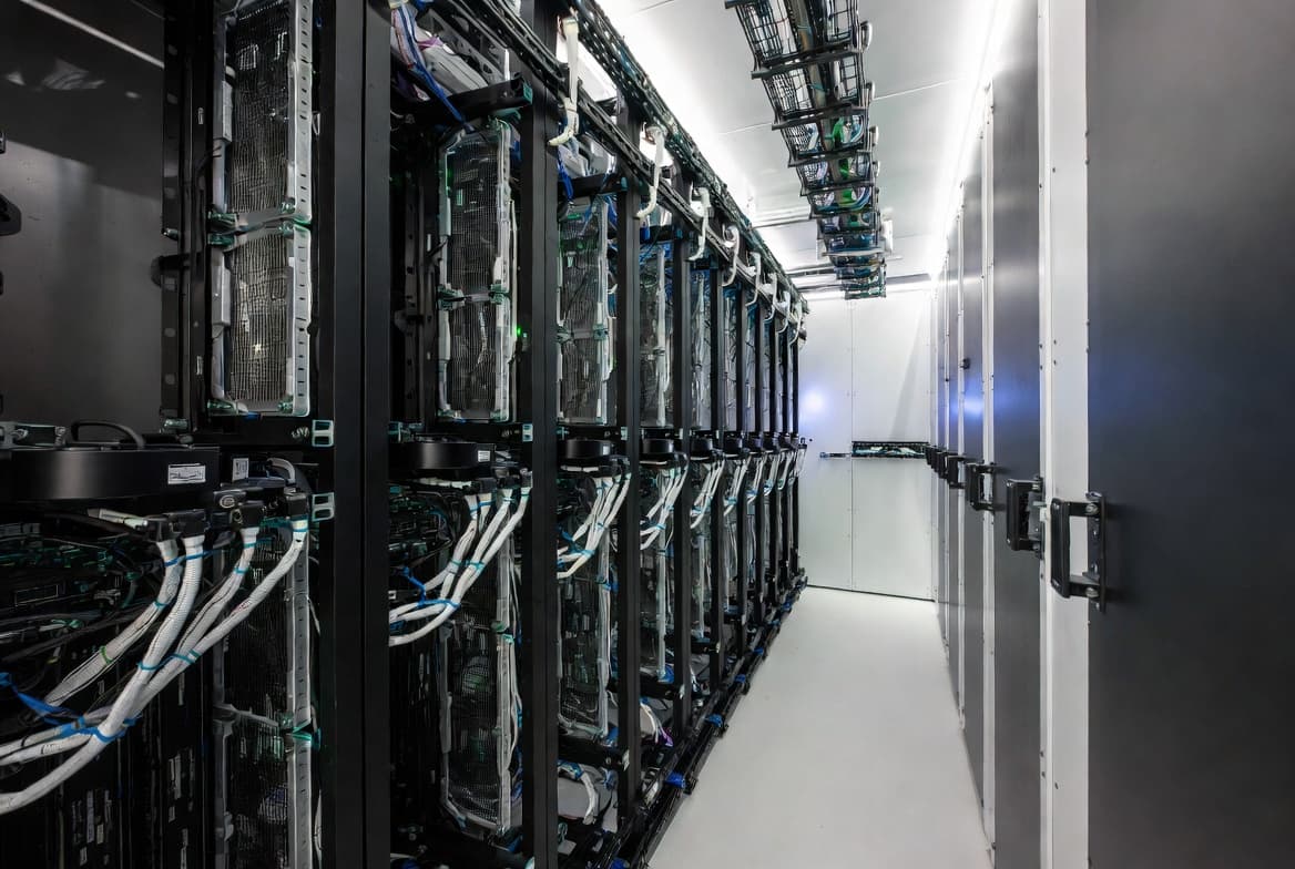 Factory-integrated racks and cabling inside a Blok